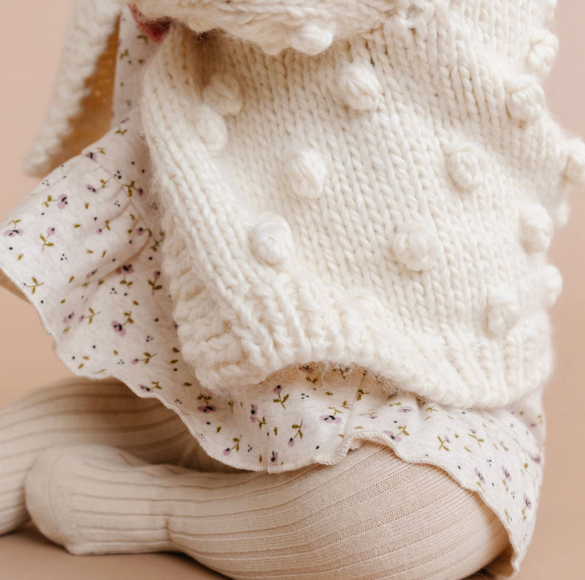 little girl in cream tights